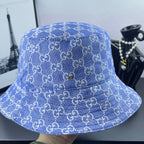 Blue GG monogram bucket hat, top view with stitched seams