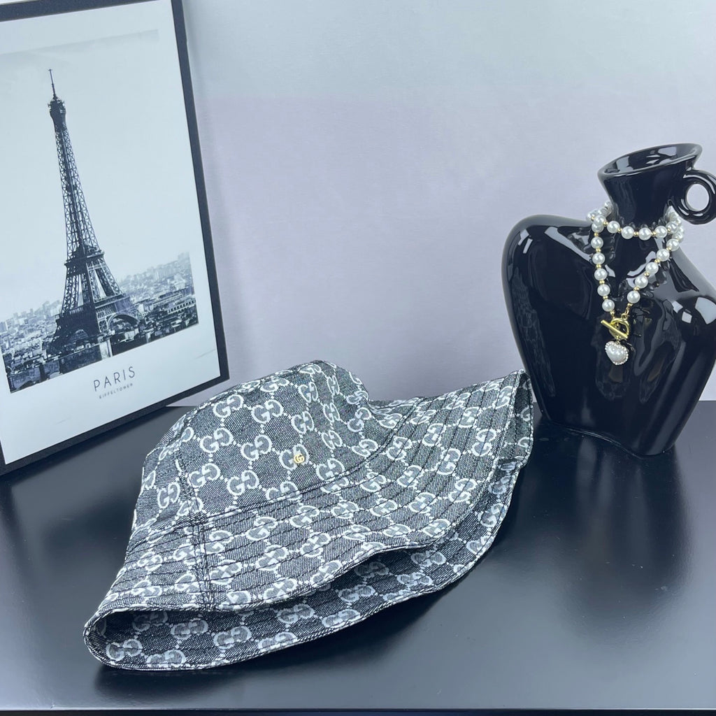 Gucci GG-print bucket hat, dark gray, side profile with wide brim