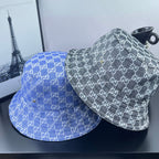 Gucci GG-print bucket hat set: blue and dark gray with repeating logo pattern