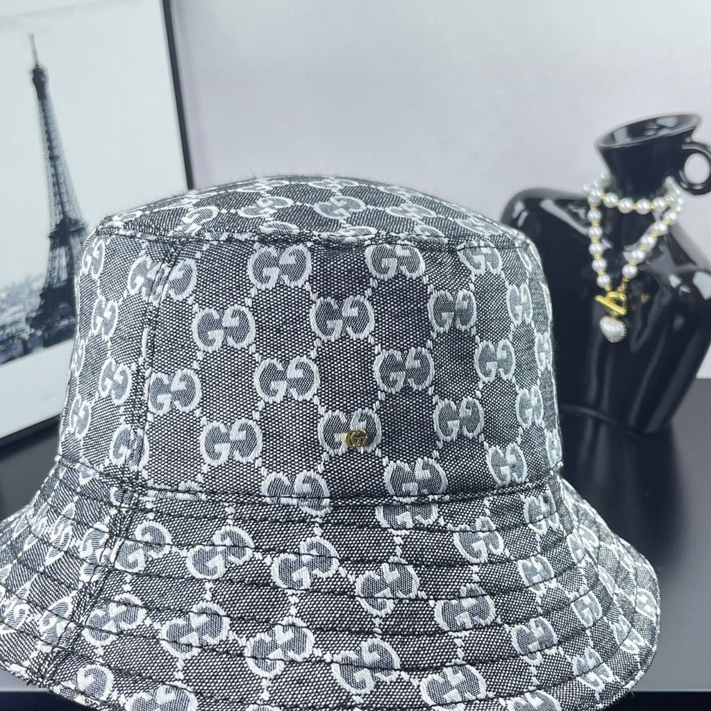 Gucci GG-print bucket hat, dark gray with stitched logo pattern across crown