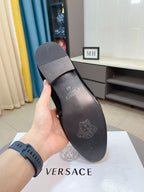 Versace loafer sole with embossed logo and slip-on heel