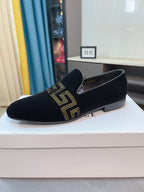 Versace black velvet loafers with gold Greca emblem strap, slip-on pointed toe