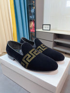 Versace black velvet loafers with gold Greca emblem panel, slip-on style