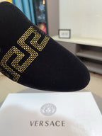 Versace black velvet loafer with gold Greca trim on side