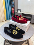 Velvet loafers set in black and burgundy with gold Medusa emblem