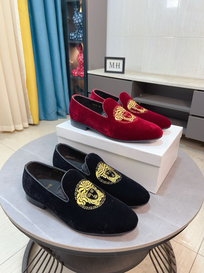 Velvet loafers set in black and burgundy with gold Medusa emblem
