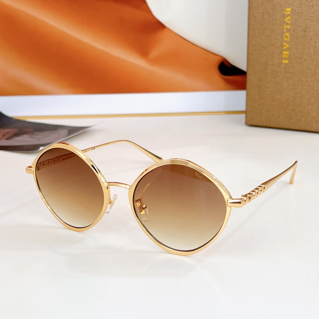 Round sunglasses with gold-tone frame and mirrored amber lenses, gold-tone temples.