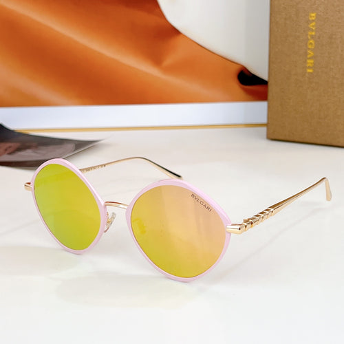 Round sunglasses with pink rim and mirrored yellow lenses, gold-tone temples.