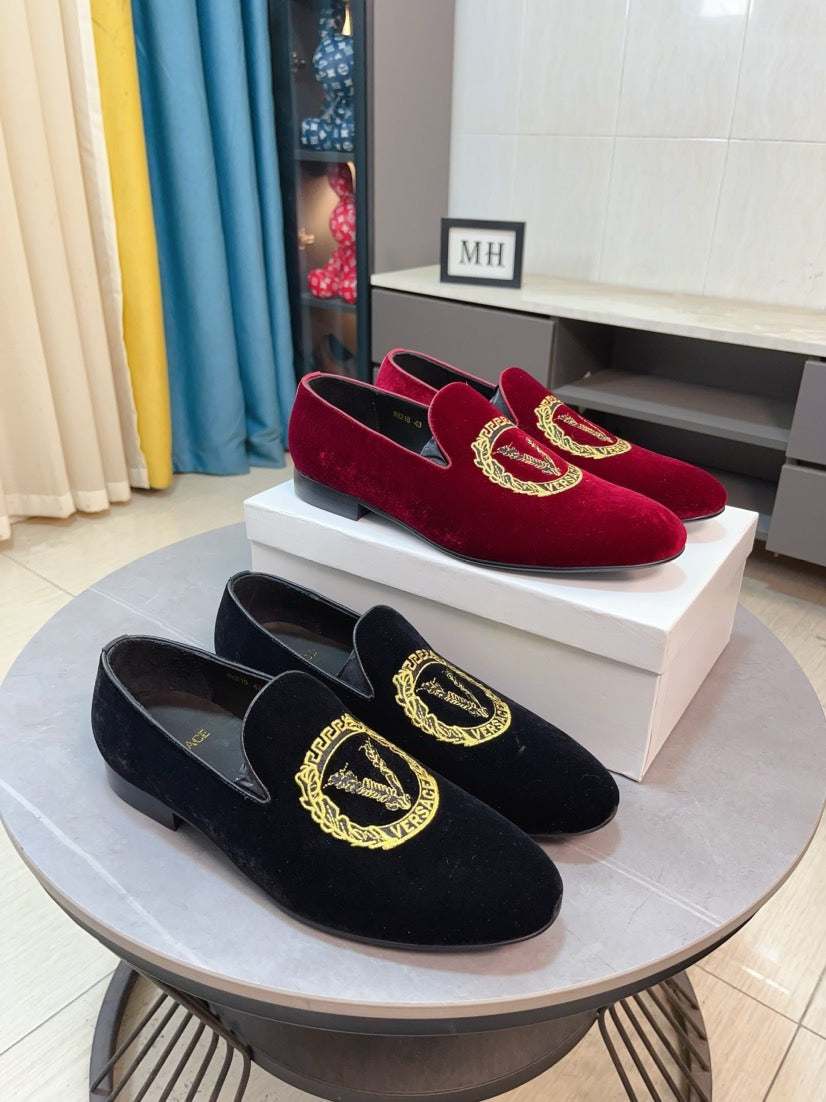Black velvet Versace loafers with gold embroidered logo on front and side