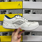 White Balenciaga unisex sneaker with blue collar and silver side logo panel