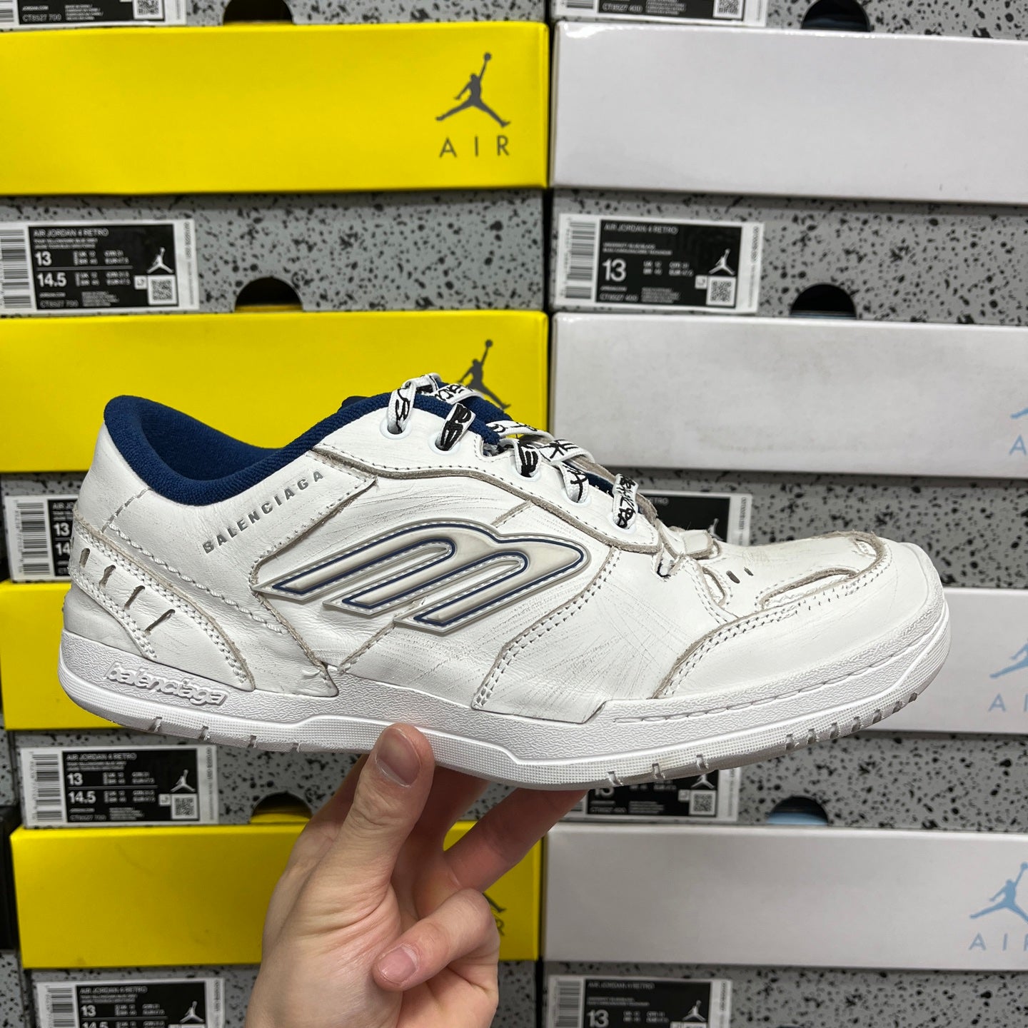 White Balenciaga unisex sneakers with blue collar, lace-up and side logo panel