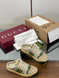 Gucci low-top sneakers in beige with green and red web stripe detail, lace-up.