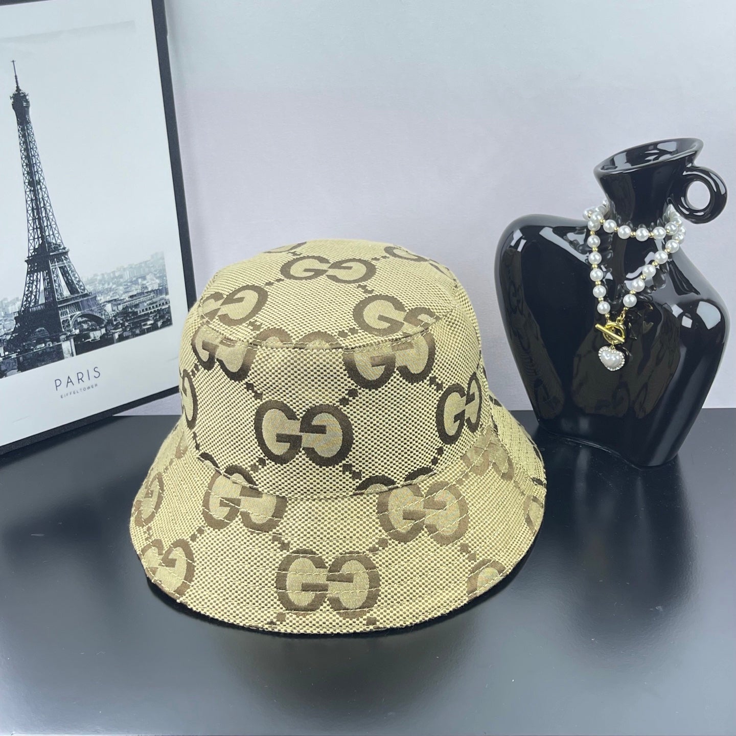 Gucci GG monogram bucket hat in beige canvas with wide brim and stitched pattern