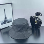 Gucci bucket hat in dark gray with allover GG monogram pattern and stitched brim