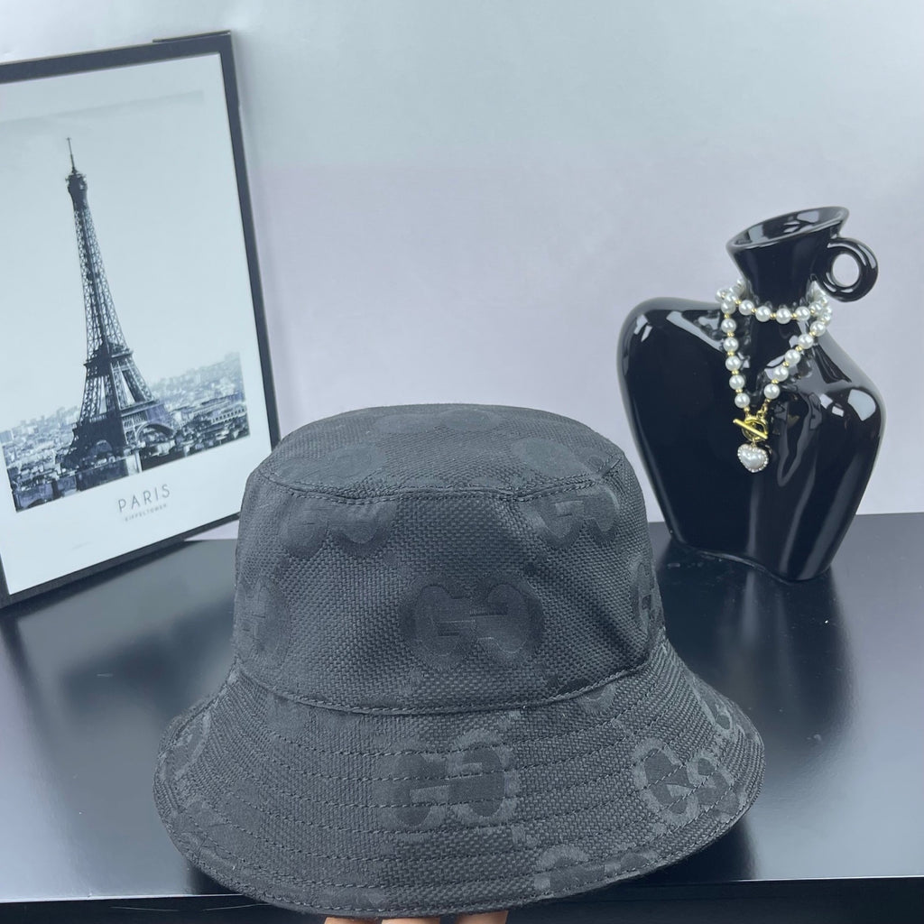Gucci bucket hat in dark gray, textured weave with subtle GG monogram motif