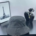 Gucci bucket hat in dark gray, textured weave with subtle GG monogram motif