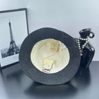 Gucci bucket hat dark gray, inside view with cream lining and visible fabric labels
