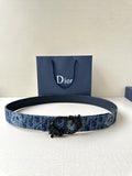 Blue Dior belt with monogram pattern and ornate black buckle, adjustable holes.