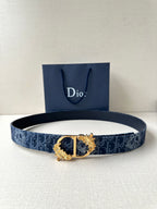 Dior belt in dark blue with monogram pattern and gold-toned emblem buckle