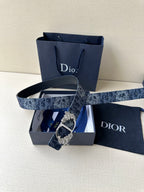 Dior belt: dark blue monogram strap with ornate gold buckle