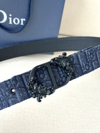 Dior belt detail: dark blue strap with black oval buckle and metal embellishment