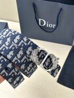 Navy and light blue logo belt with silver-toned buckle and decorative crest