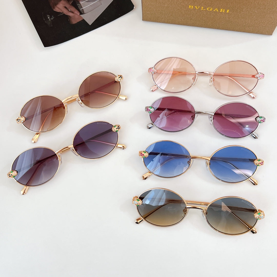 Set of round sunglasses with rose and gold frames, tinted lenses, jeweled temple details