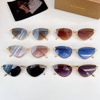 Assorted cat-eye sunglasses with various frames and gradient lens colors