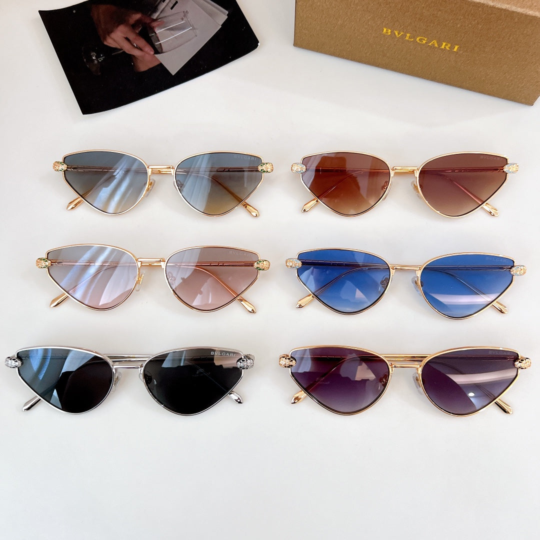 Assorted cat-eye sunglasses with various frames and gradient lens colors