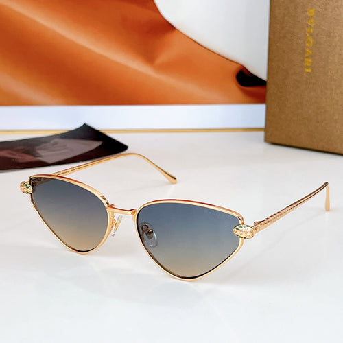 Cat-eye sunglasses with gold-tone frame and gray gradient lenses