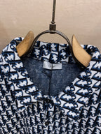 Navy and white patterned shirt collar with Dior label