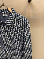 Navy and white patterned long-sleeve shirt with button placket