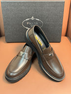 Prada unisex loafers with dark metallic brown leather and green Prada insole text