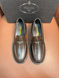 Prada unisex loafers in dark metallic brown leather, stitched apron and moc-style seams