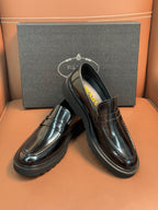 Prada unisex loafers in dark metallic leather, angled top view with slip-on vamp