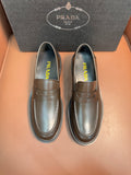 Metallic brown loafers with penny strap, stitched apron, Prada insole branding