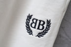 Balenciaga crest logo patch on white shorts