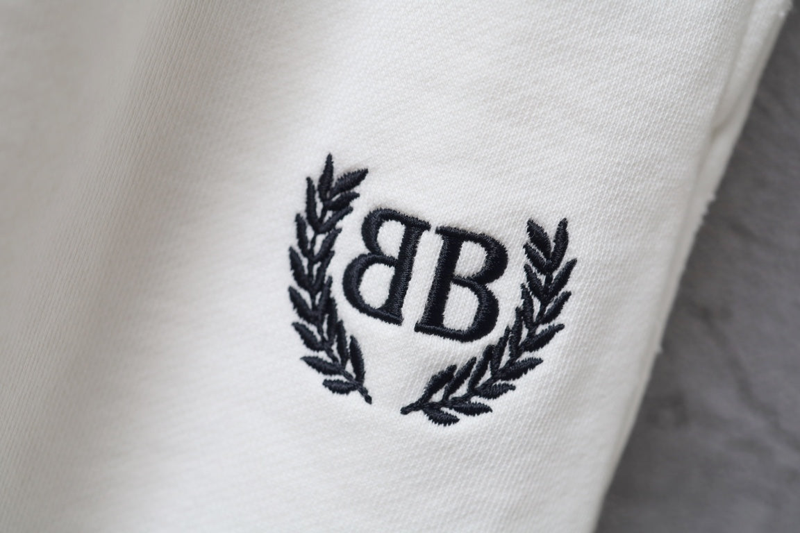 Balenciaga crest logo patch on white shorts