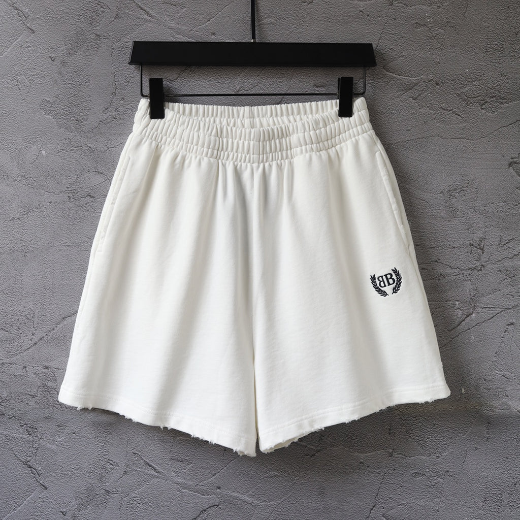 Balenciaga white shorts with elastic waistband and crest logo on side