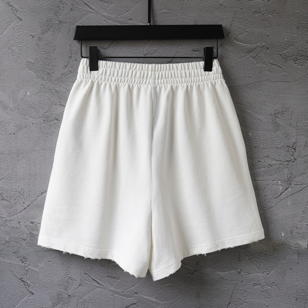Balenciaga white shorts with pleated front and elastic waistband