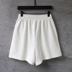Balenciaga white shorts with pleated front and elastic waistband