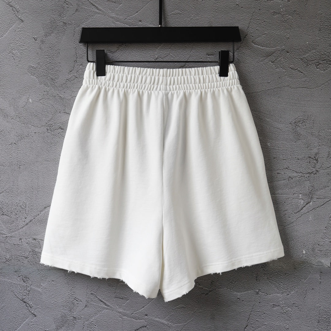 Balenciaga white shorts with pleated front and elastic waistband