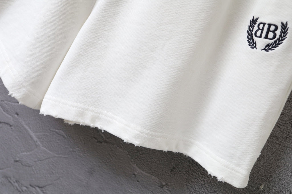 Balenciaga white shorts with raw hem edge