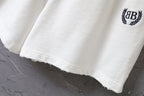 Balenciaga white shorts with raw hem edge