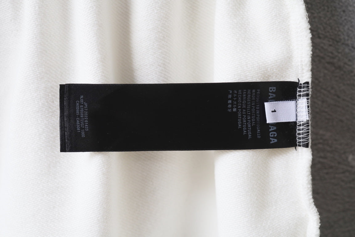 Balenciaga white shorts with white label tag on inner hem