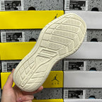 White Balenciaga sneaker outsole with tread pattern, held in hand