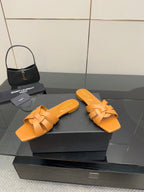 YSL women's orange woven slide sandals, crossover strap design with flat sole