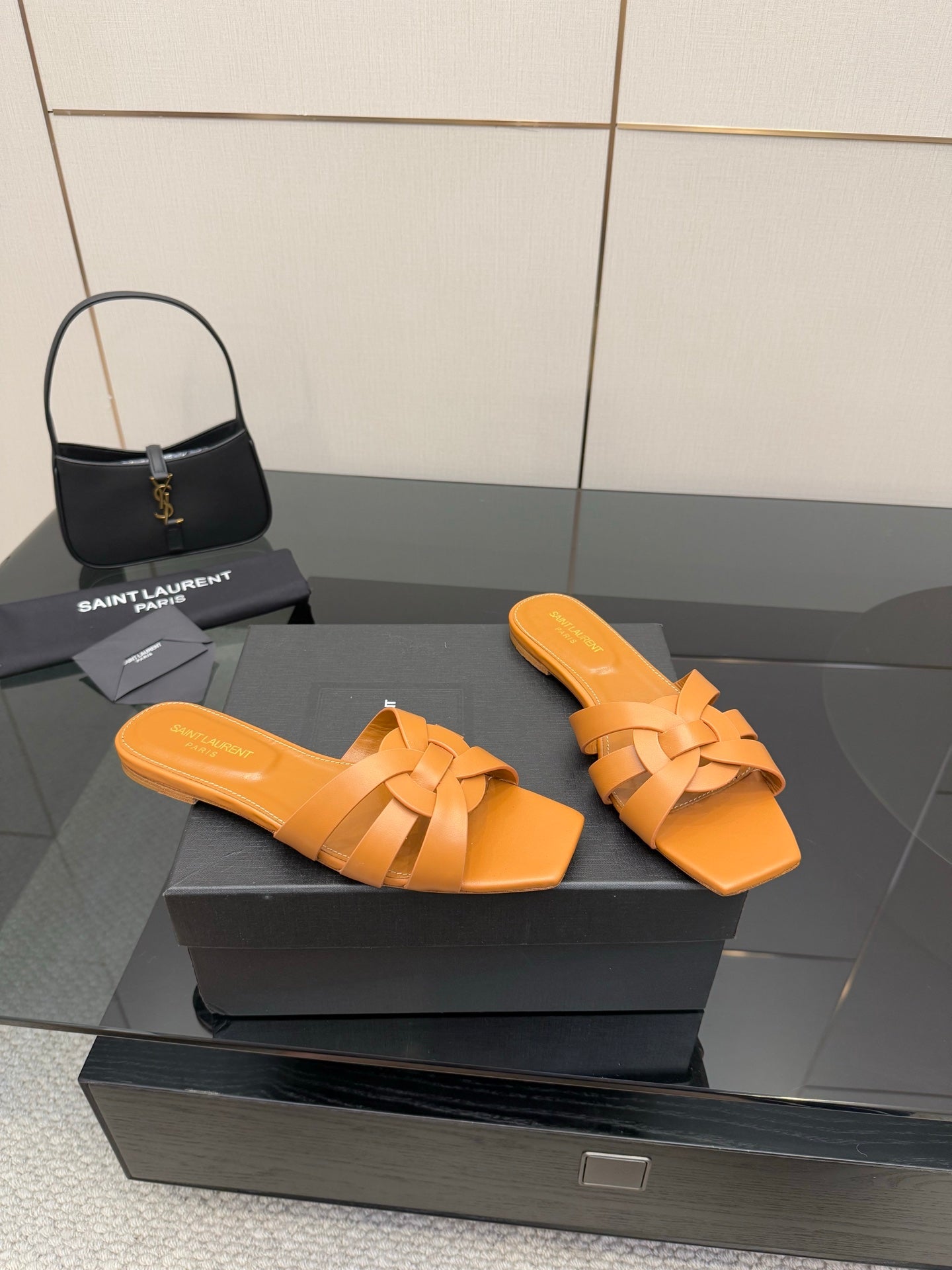 YSL women's orange woven slide sandals, crossover straps with flat slide sole
