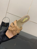 YSL ladies sandal on hand, beige upper with woven knot detail, open toe