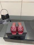 YSL patent pink bow mules, open toe slip-on sandals with glossy strap details on box